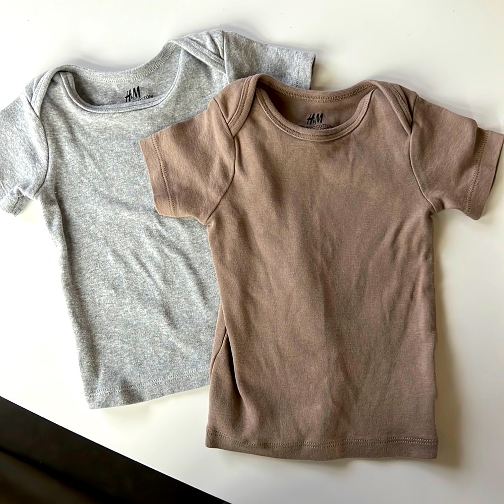2 never worn H&M organic cotton shirts - colors grey and dark tan. Size 6 months
